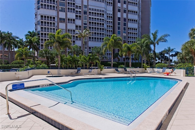 pool with a patio area