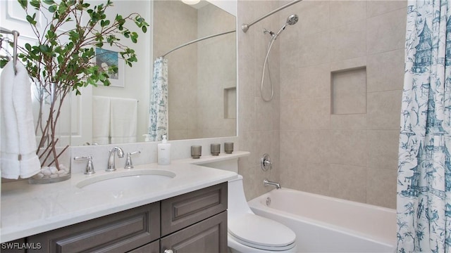 full bathroom with vanity, toilet, and shower / bath combo with shower curtain