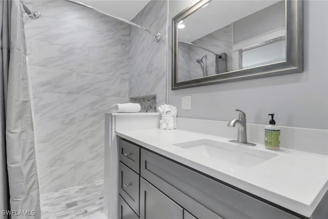 bathroom with vanity and a shower with curtain