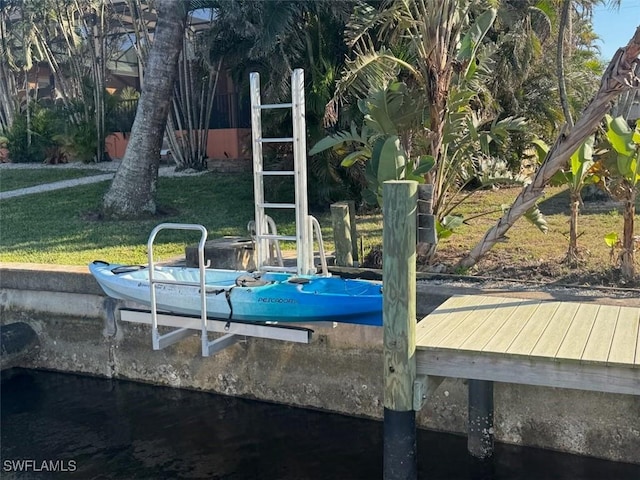 view of jungle gym with a water view and a lawn