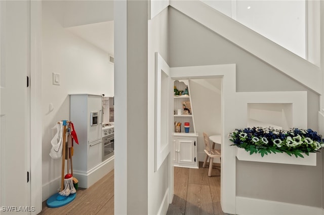 hall featuring light wood-type flooring