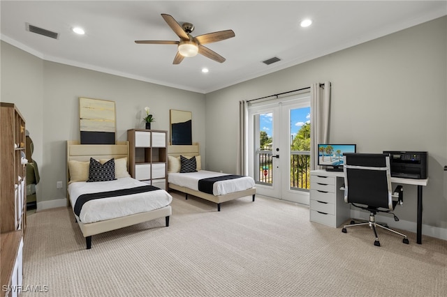 carpeted bedroom featuring crown molding, access to outside, and french doors