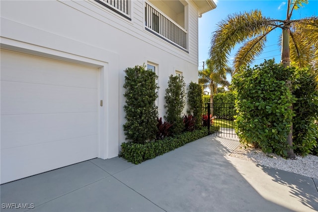 view of side of home with a garage