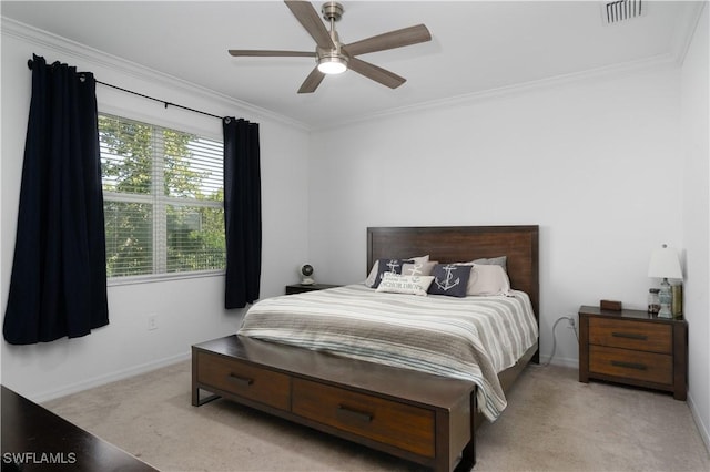 bedroom featuring crown molding, ceiling fan, and light carpet