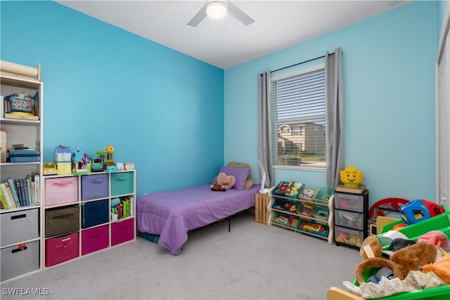 carpeted bedroom with ceiling fan