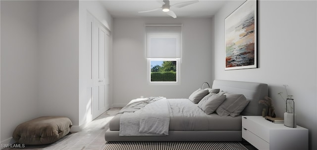 bedroom featuring ceiling fan and a closet