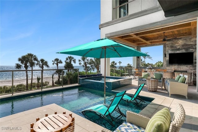 view of pool featuring a water view, a patio area, a beach view, a bar, and an in ground hot tub