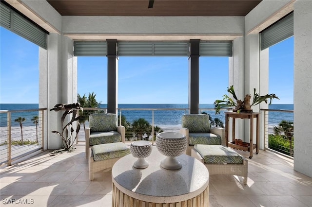 sunroom with a water view