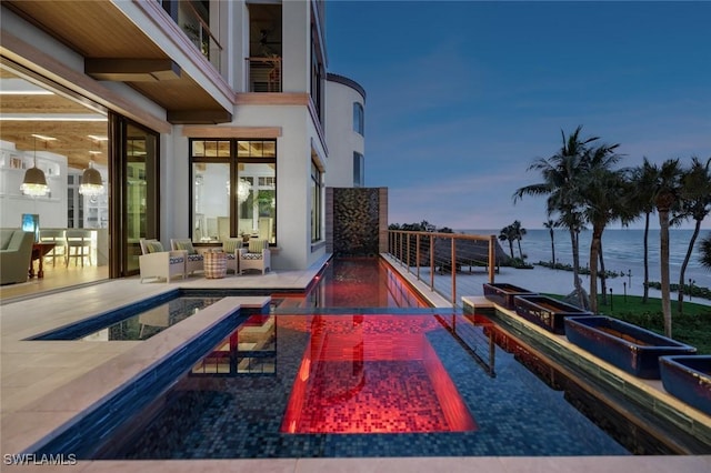 exterior space with a water view