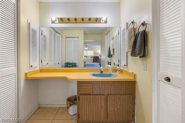 bathroom featuring tile patterned floors and vanity