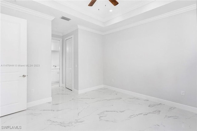4091 56th Ave NE, Naples, FL 34120 - empty room with a ceiling fan, light marble finish flooring, baseboards, and crown molding