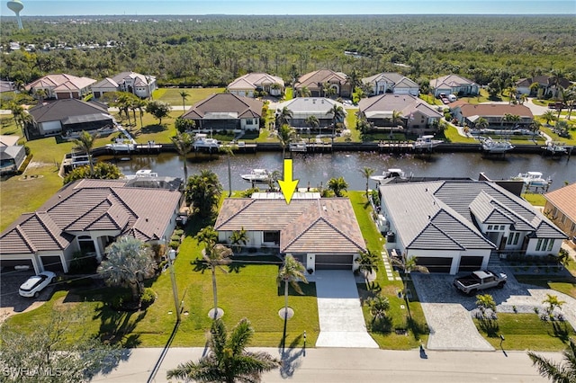 drone / aerial view with a water view