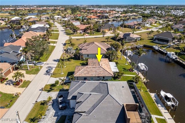 drone / aerial view featuring a water view