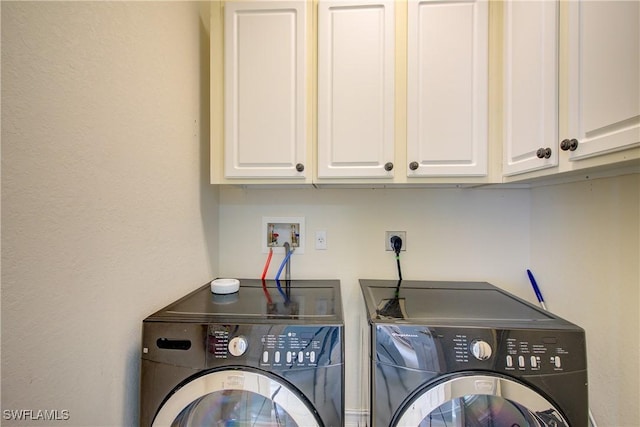 13911 Lake Mahogany Blvd Unit 2922, Fort Myers, FL 33907 - washroom featuring cabinet space and separate washer and dryer