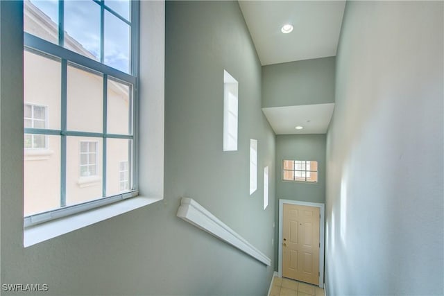 13911 Lake Mahogany Blvd Unit 2922, Fort Myers, FL 33907 - staircase with baseboards and a towering ceiling