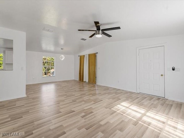 interior space with lofted ceiling, light hardwood / wood-style flooring, and ceiling fan