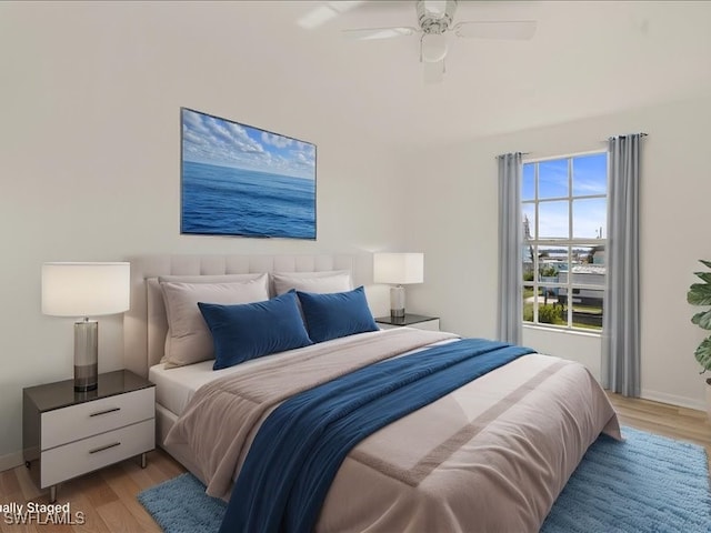 bedroom featuring ceiling fan and light wood-type flooring