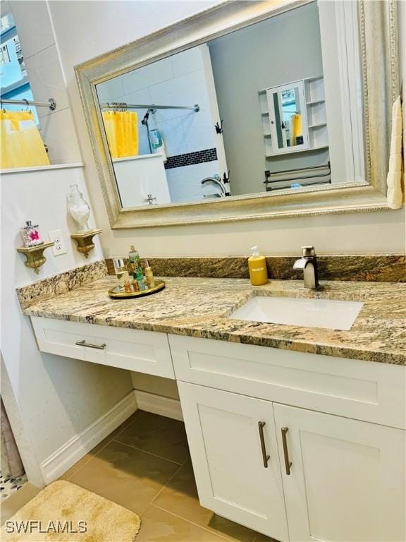 bathroom with vanity and curtained shower