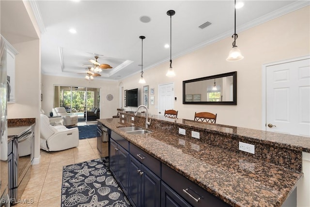 10696 Camarelle Cir, Fort Myers, FL 33913 - kitchen with a sink, electric range, ornamental molding, open floor plan, and a ceiling fan