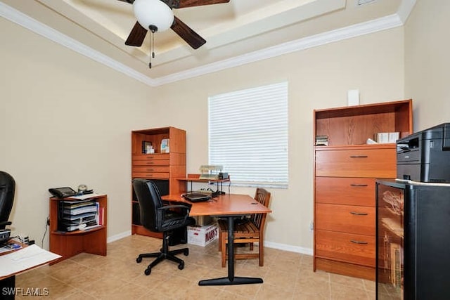 office space featuring crown molding, ceiling fan, a raised ceiling, and light tile patterned floors