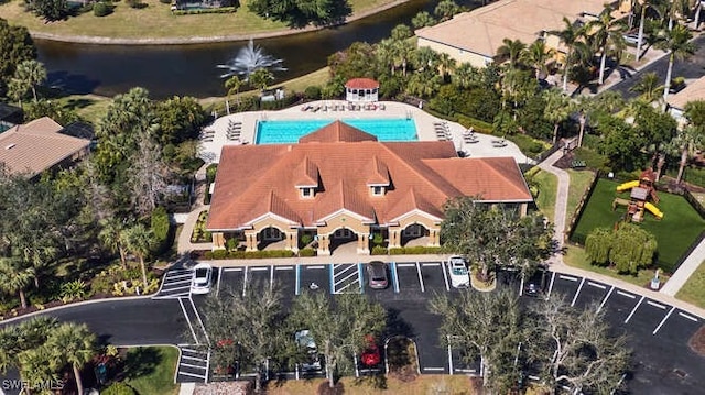 birds eye view of property featuring a water view