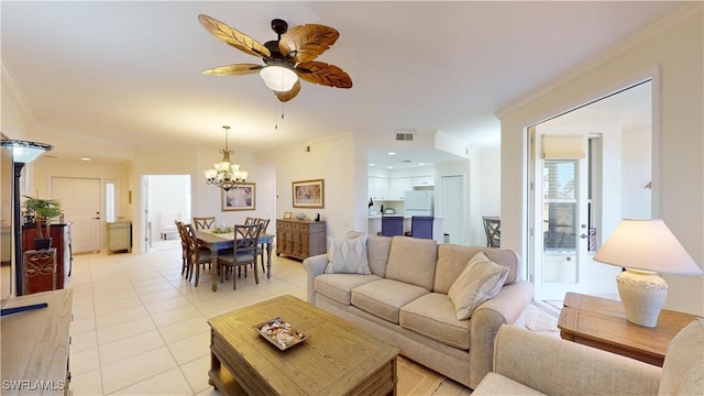 living room featuring light tile patterned floors, crown molding, and ceiling fan with notable chandelier