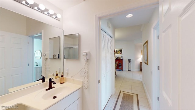 bathroom featuring vanity and tile patterned flooring