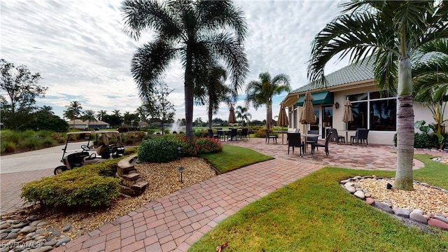 view of property's community featuring a patio