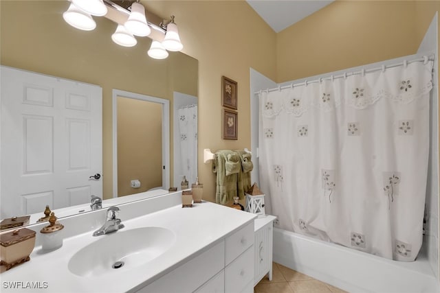 bathroom featuring vanity, a chandelier, tile patterned flooring, and shower / bath combo with shower curtain