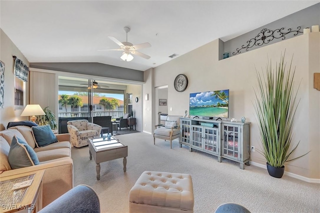 living room with vaulted ceiling, carpet floors, and ceiling fan