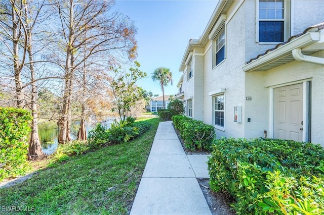 exterior space with a lawn