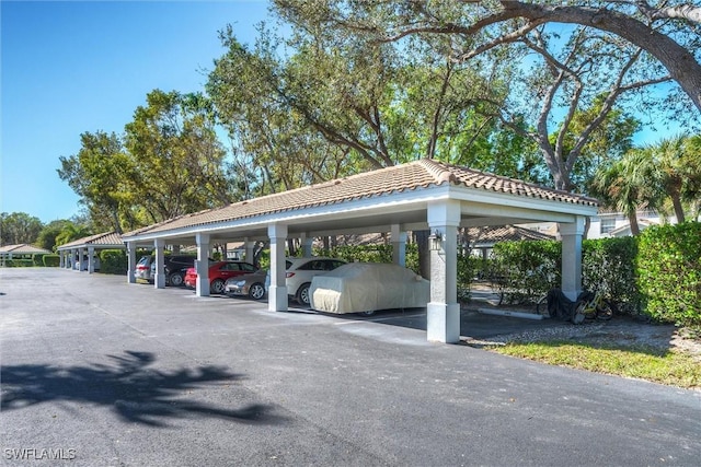 view of car parking featuring a carport