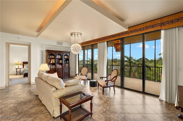 interior space with a wealth of natural light, visible vents, and a notable chandelier