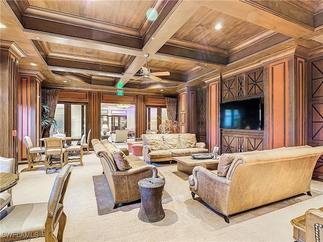 living room with wood walls, coffered ceiling, crown molding, wooden ceiling, and beam ceiling