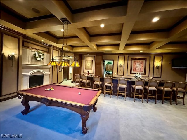 playroom with coffered ceiling, indoor wet bar, carpet floors, a fireplace, and beam ceiling