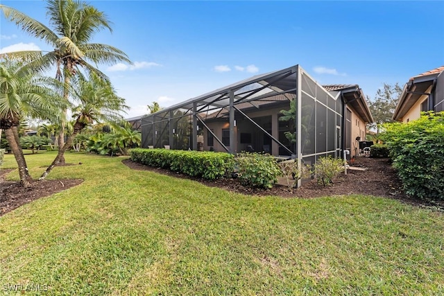 view of yard with a lanai