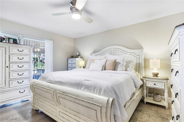 bedroom featuring a ceiling fan and wood finished floors