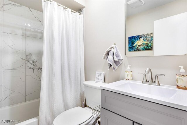 bathroom with vanity, toilet, visible vents, and shower / bath combo