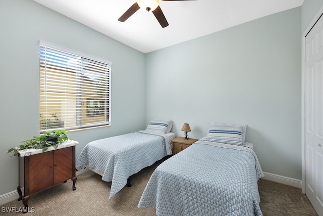 bedroom featuring carpet floors, a closet, and ceiling fan