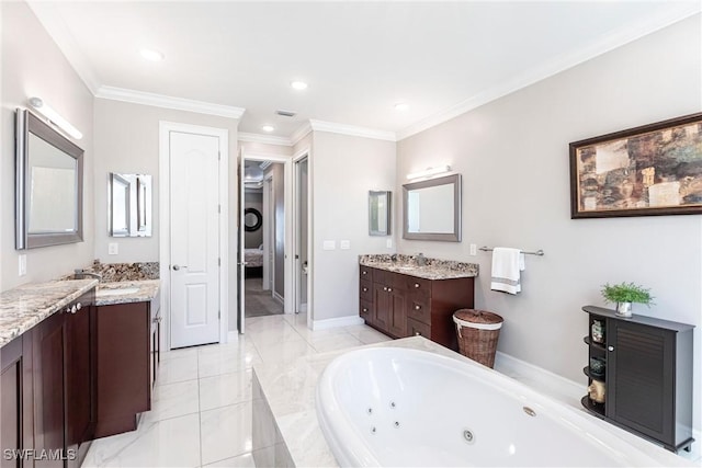 bathroom with vanity, ornamental molding, and tiled bath