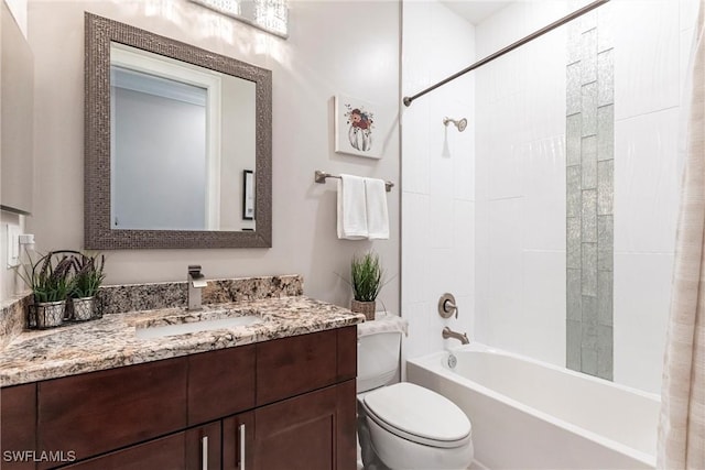 full bathroom with vanity, shower / tub combo with curtain, and toilet