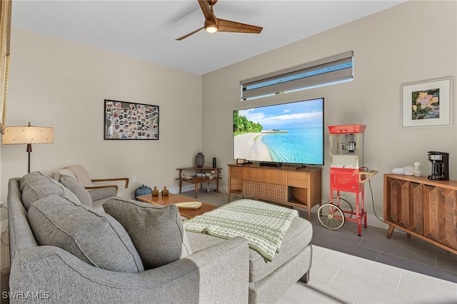 living room with tile patterned flooring and ceiling fan