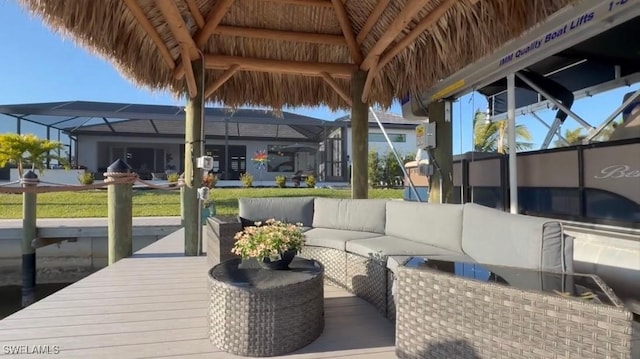 dock area featuring a lanai and an outdoor living space