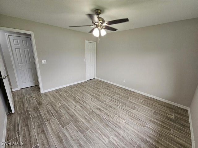 unfurnished room featuring ceiling fan