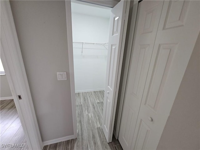 hallway featuring light hardwood / wood-style floors