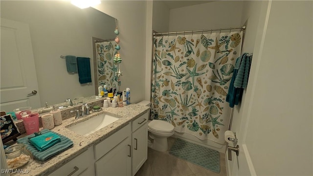 full bathroom featuring vanity, tile patterned floors, toilet, and shower / tub combo with curtain