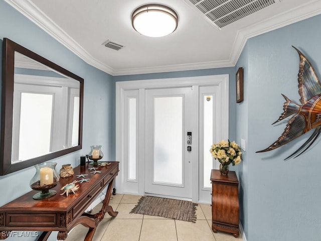 tiled entryway with crown molding