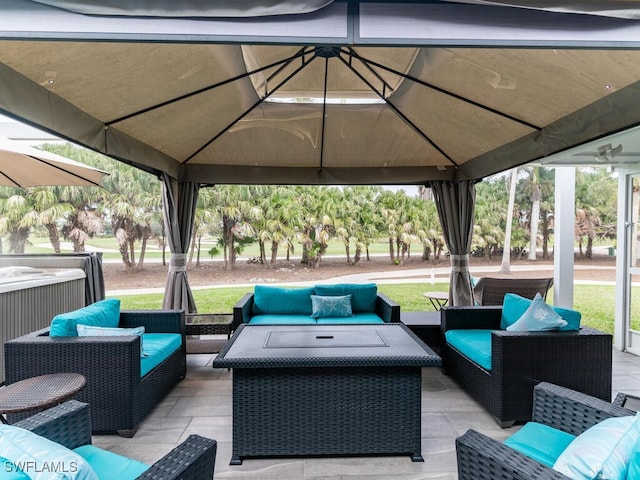 view of patio with a gazebo and outdoor lounge area