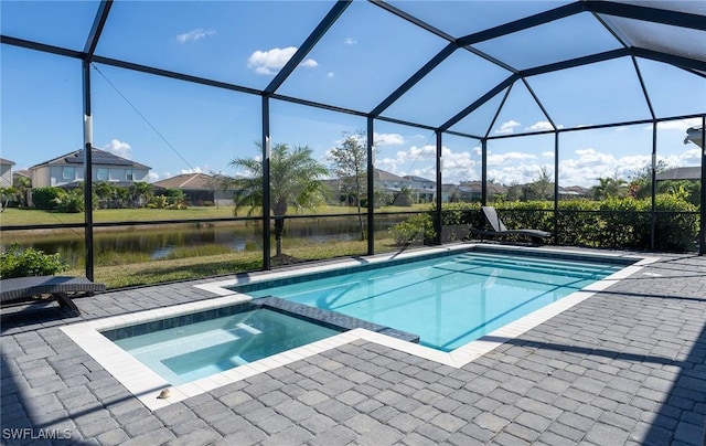 view of pool featuring a water view, an in ground hot tub, a lanai, and a patio