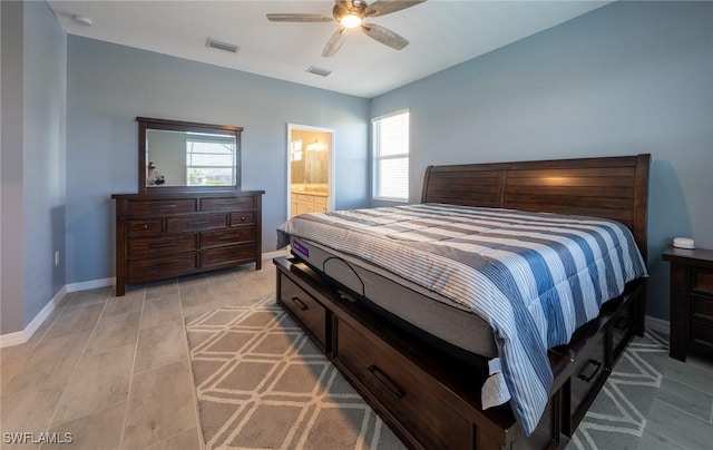 bedroom featuring ceiling fan and ensuite bathroom